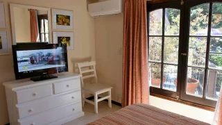 Dormitorio principal Apartamento Bosque - 1 dormitorio jardin interno, Las Hadas, Cariló