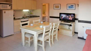 Comedor Apartamento Bosque - 1 dormitorio vista parque, Las Hadas, Cariló